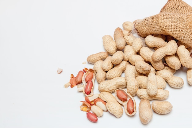 Large peeled peanuts closeup of beans in the shell