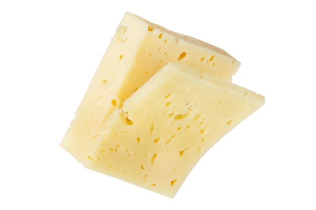 A large piece of cheese with a slice cut off isolated on a white background Cheese for pizza Sliced piece of cheese on a white background closeup Insert into a design or project