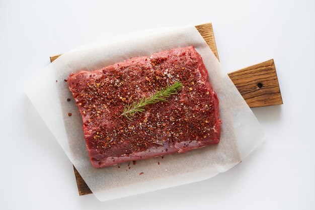 Large piece of meat with spices