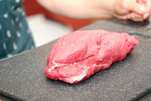 Large piece of red meat ready to cut