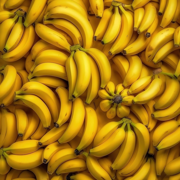 Photo a large pile of bananas is shown with one of them on the top.