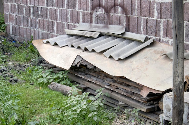 Large pile of firewood cut of wood dark texture group of objects