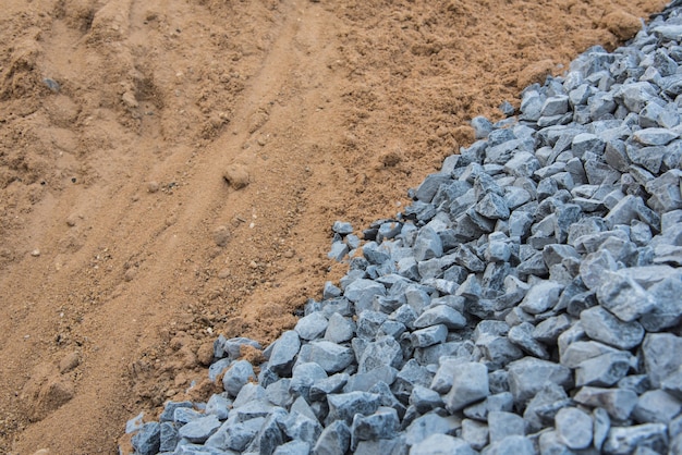 Large piles of gravel and sand for construction