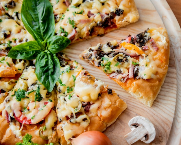 Large pizza on a wooden table. Restaurant.