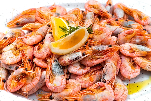 A large plate of shrimp.