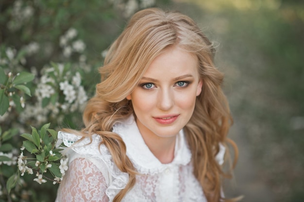 Large portrait of a beautiful girl in white flowers 2696