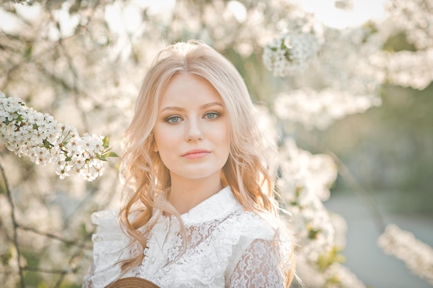 A large portrait of a blonde among flowers 2729