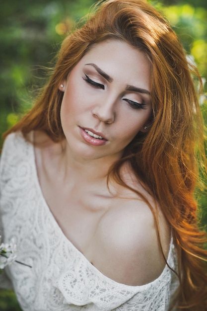 Large portrait of a girl with long red hair 6184