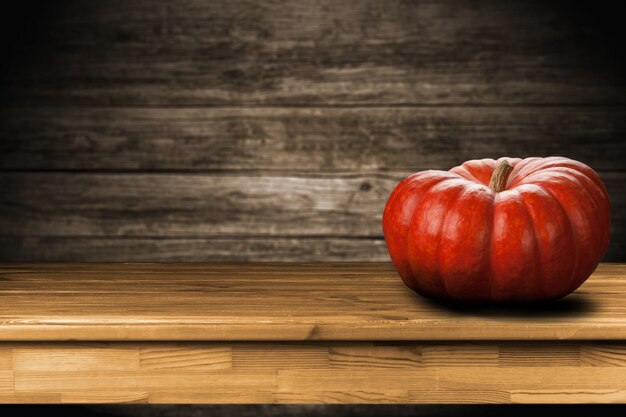 large pumpkin on wood