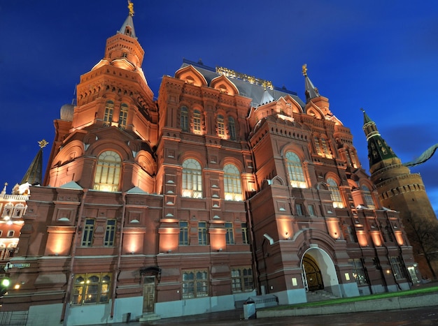 A large red building with the word " moscow " on the top.