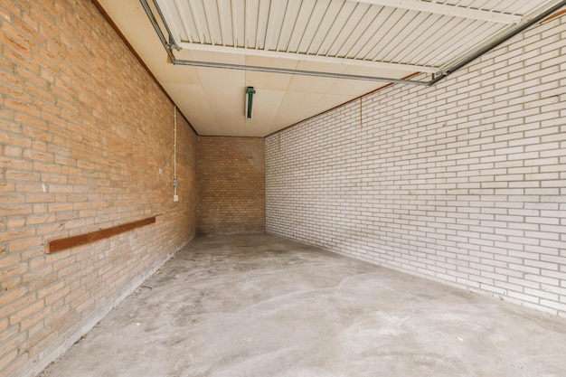 A large room with brick walls and a concrete floor