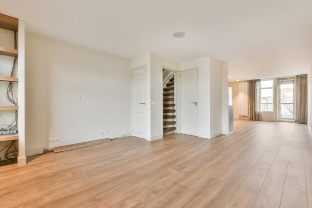 Large room with dark parquet floor