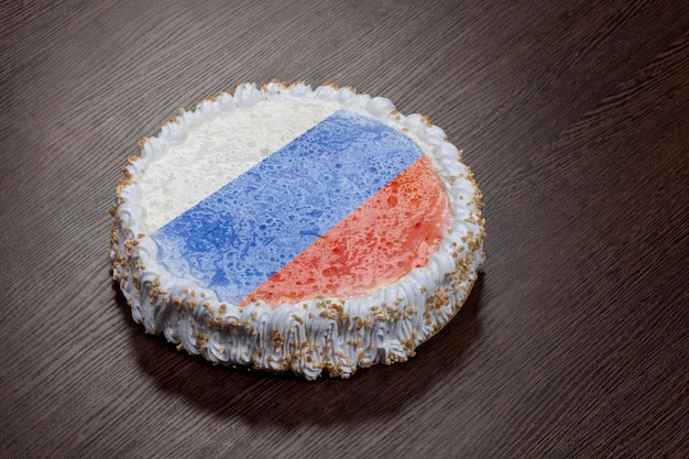 Large round cake with a picture of the flag of Russia