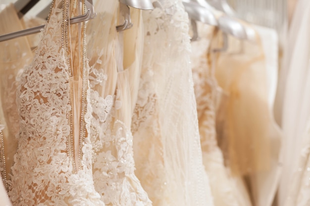 Large selection of dresses in the wedding salon.