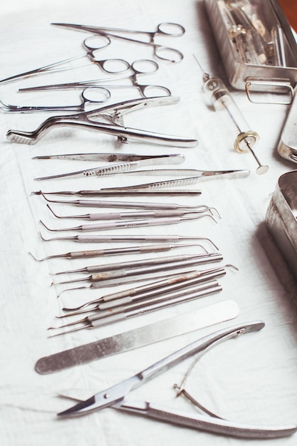 A large set of vintage dental instruments