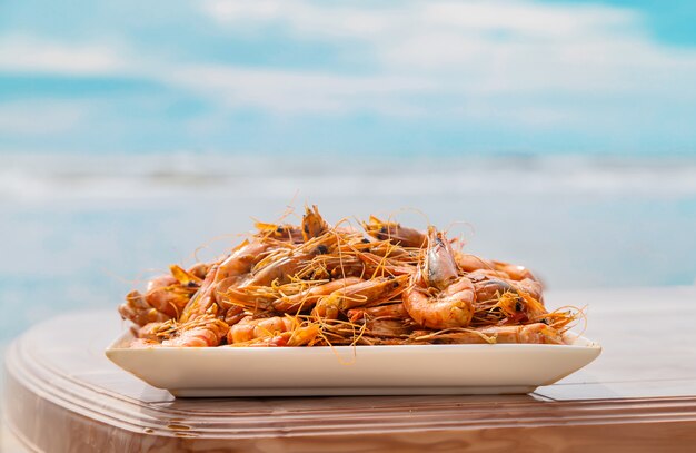 Large shrimp on a plate, sea views