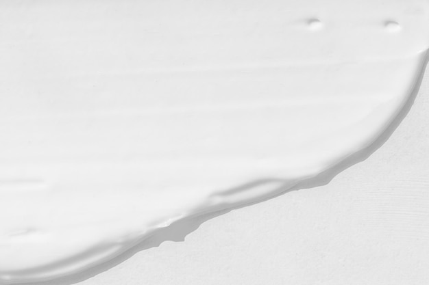 Large smears of white cosmetic cream The texture of the cream closeup