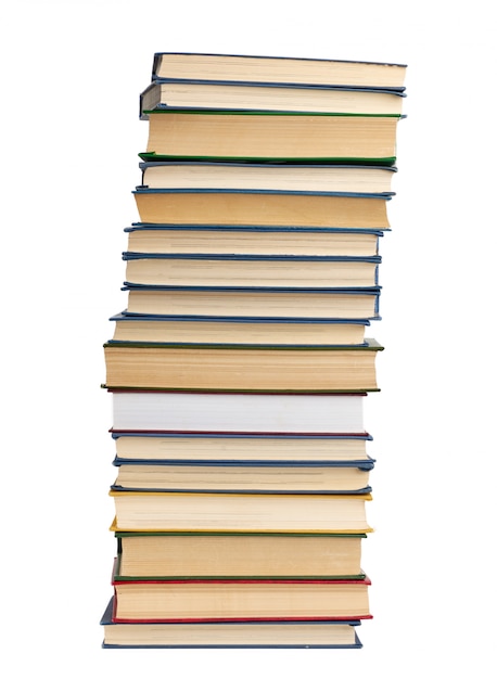 Large stack of hardback books isolated