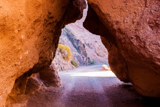 large stones from the red rocks form an arch