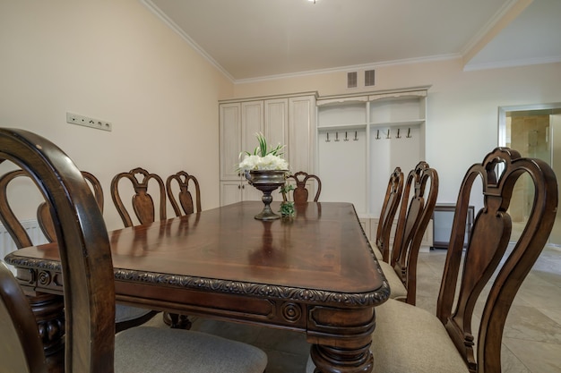 Large table with chairs in the banquet hall