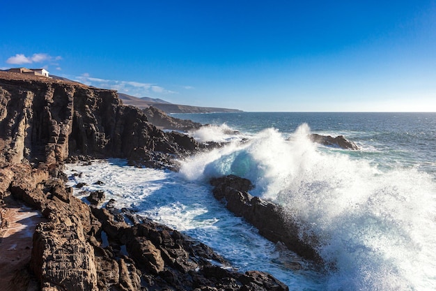 large waves crashing in the escarpment area of the municipality of Betancuria, Fuerteventura