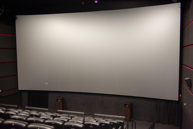 A large white screen in a theater