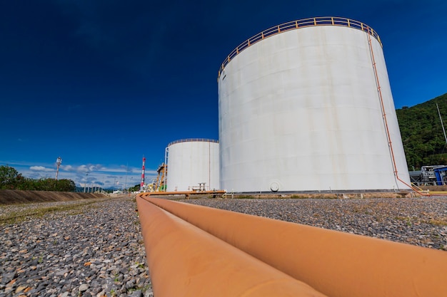 Large white tanks for petrol pipeline oil and gas.