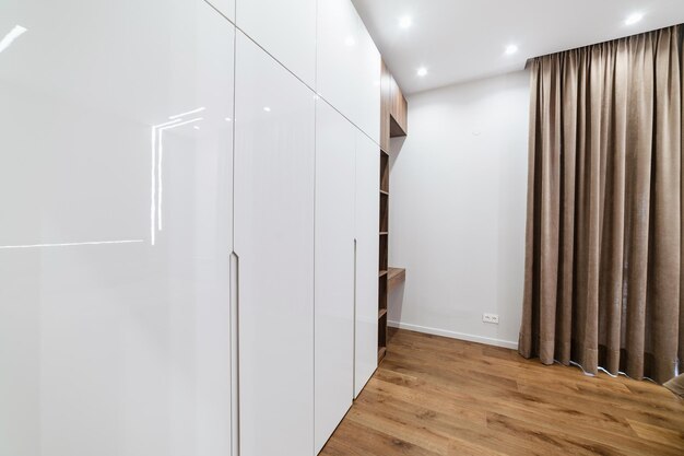 Large, white wardrobe in the dressing room