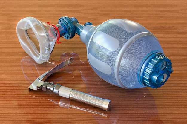 Laryngoscope and Ambu Bag for ventilation resuscitation on wooden table 3D rendering