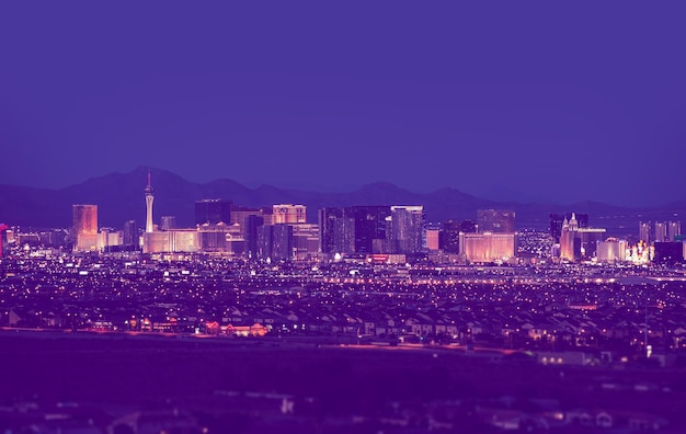 Las vegas cityscape at night in vintage purple color grading las vegas nevada united states