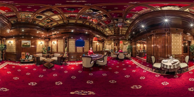 LAS VEGAS USA JUNE 2019 full seamless hdri panorama 360 degrees view in interior elite luxury vip casino with rows of slot machines in red style in equirectangular spherical projection VR content