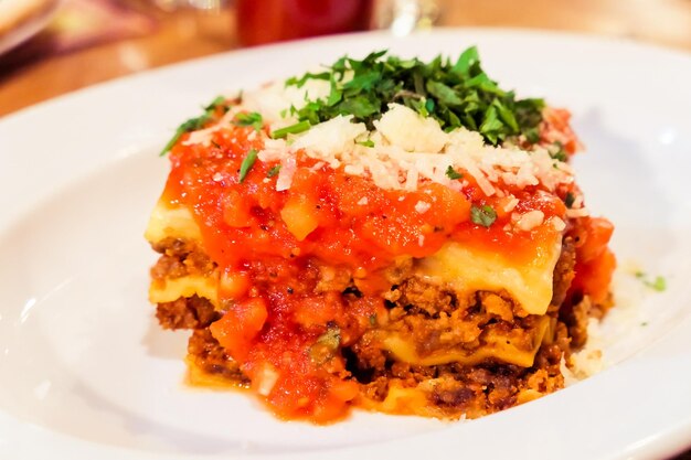 Lasagna bolognese plate traditional recipe with tomato sauce cheese and meat