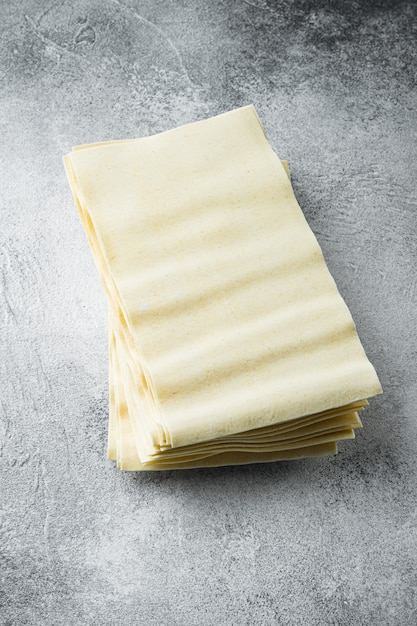 Lasagna dough sheets set, on gray stone table