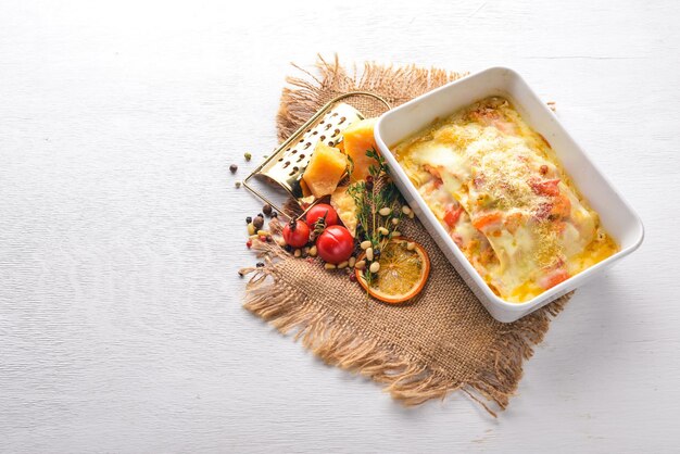 Lasagna Italian cuisine Top view Free space for text On a wooden background