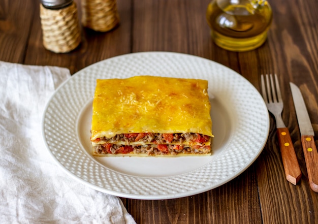 Lasagna on a wooden surface Italian cuisine