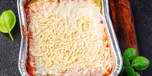 lasagne groente container snack vegetarische maaltijd eten op tafel kopie ruimte voedsel achtergrond