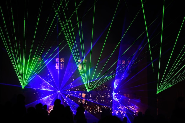 Laser show with blue green glow