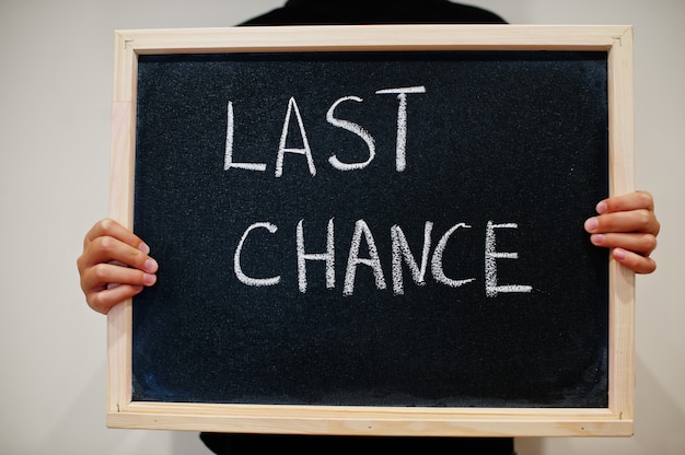 Last chance written on chalkboard