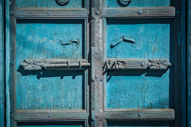 Photo latch with padlock on door in india