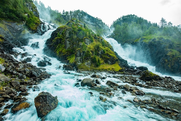 Latefossen waterfall in Hordaland Norway Old stone bridge