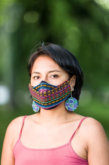 Latin america bolivian woman with traditional pattern cloth\
mask handmade quechua native textile face mask for covid19\
coronavirus protection