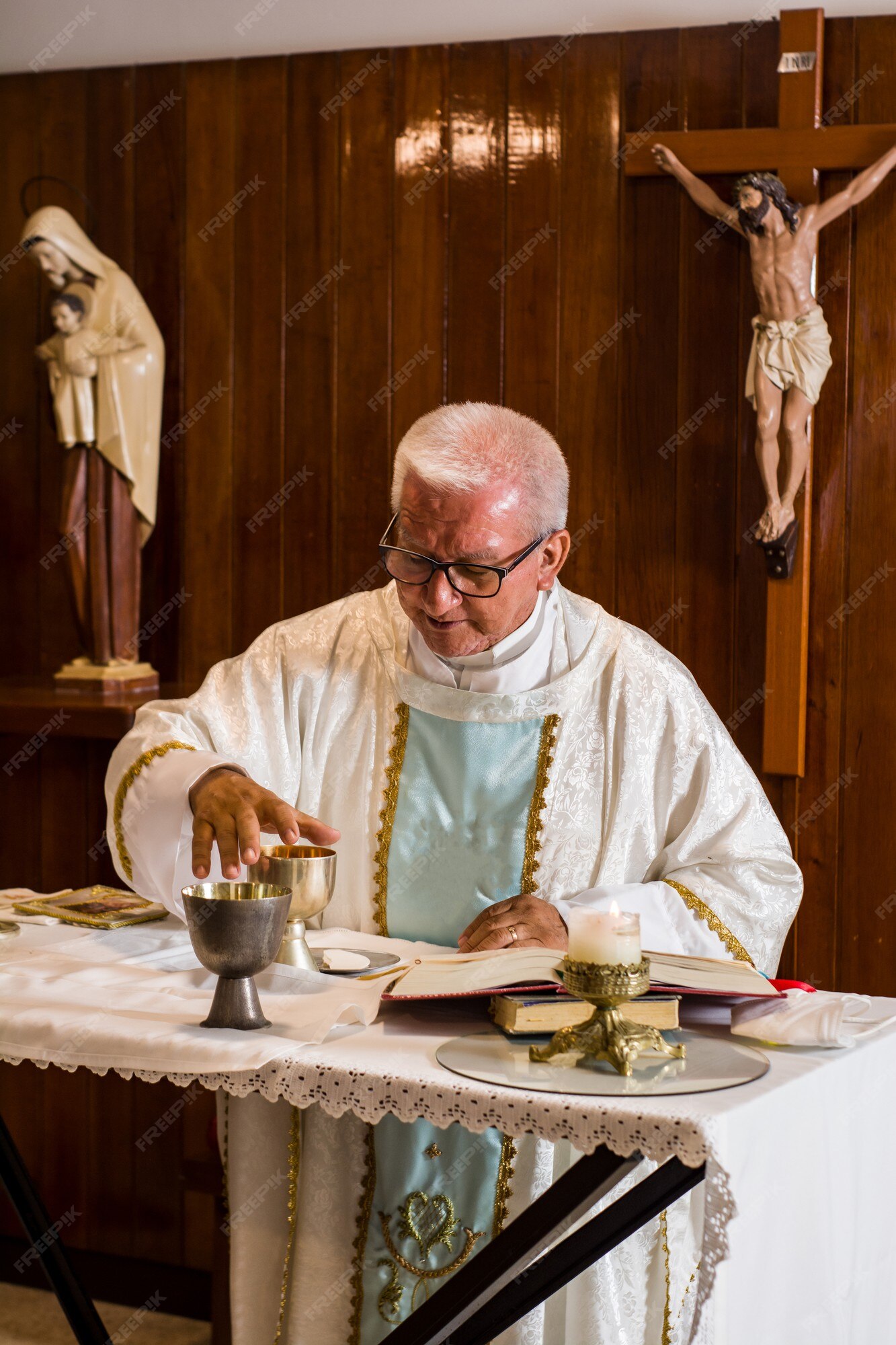 Premium Photo | Latin catholic priest preaching in the church during the  liturgy in different poses