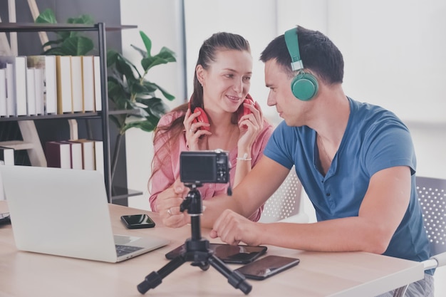 Latin couple listening music headphones casual indoor