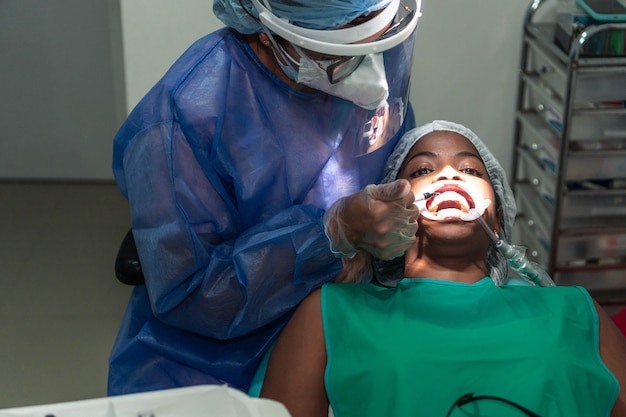 Latin Dentist Doing A Dental Check Up