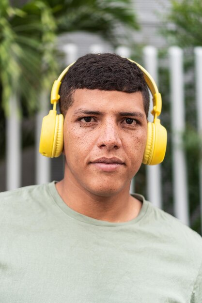 Latin freckled man looking at camera