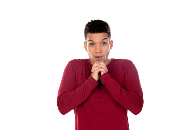 Latin guy with short afro hair isolated on white background