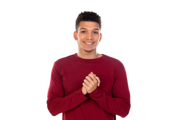 Latin guy with short afro hair isolated on white wall