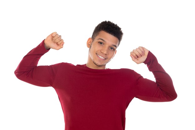 Latin guy with short afro hair isolated on white wall