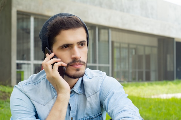 Latin man talking on the phone