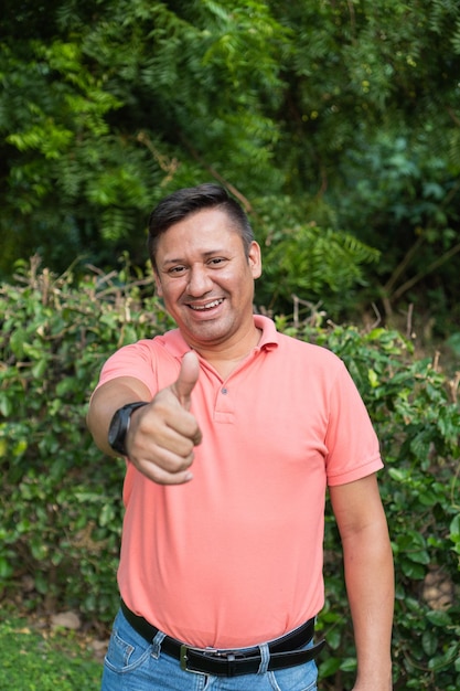 Latino businessman smiling and looking at the camera